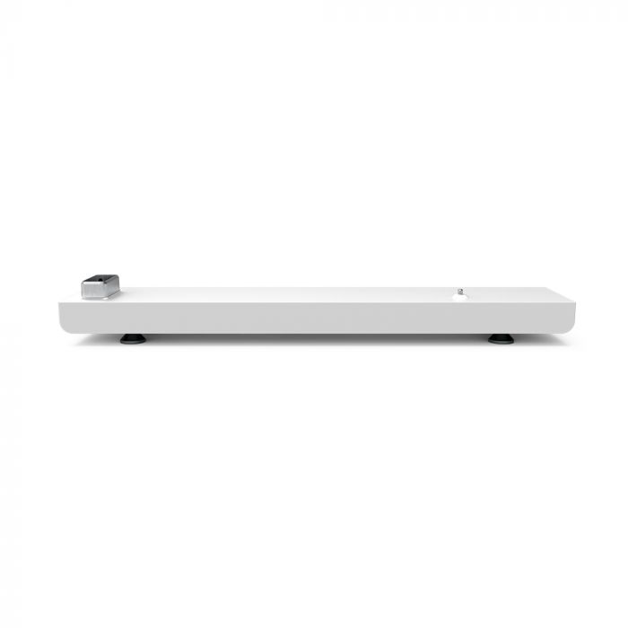Low-profile white rectangular platform with rounded edges, black feet, and a small metallic connector and latch on the top surface.