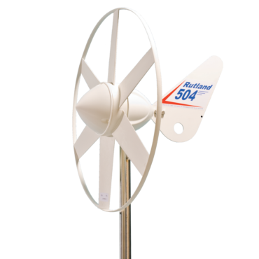 Rutland 504 Windcharger – compact white wind turbine with five blades and a safety ring, mounted on a vertical pole, designed for 12V battery charging.